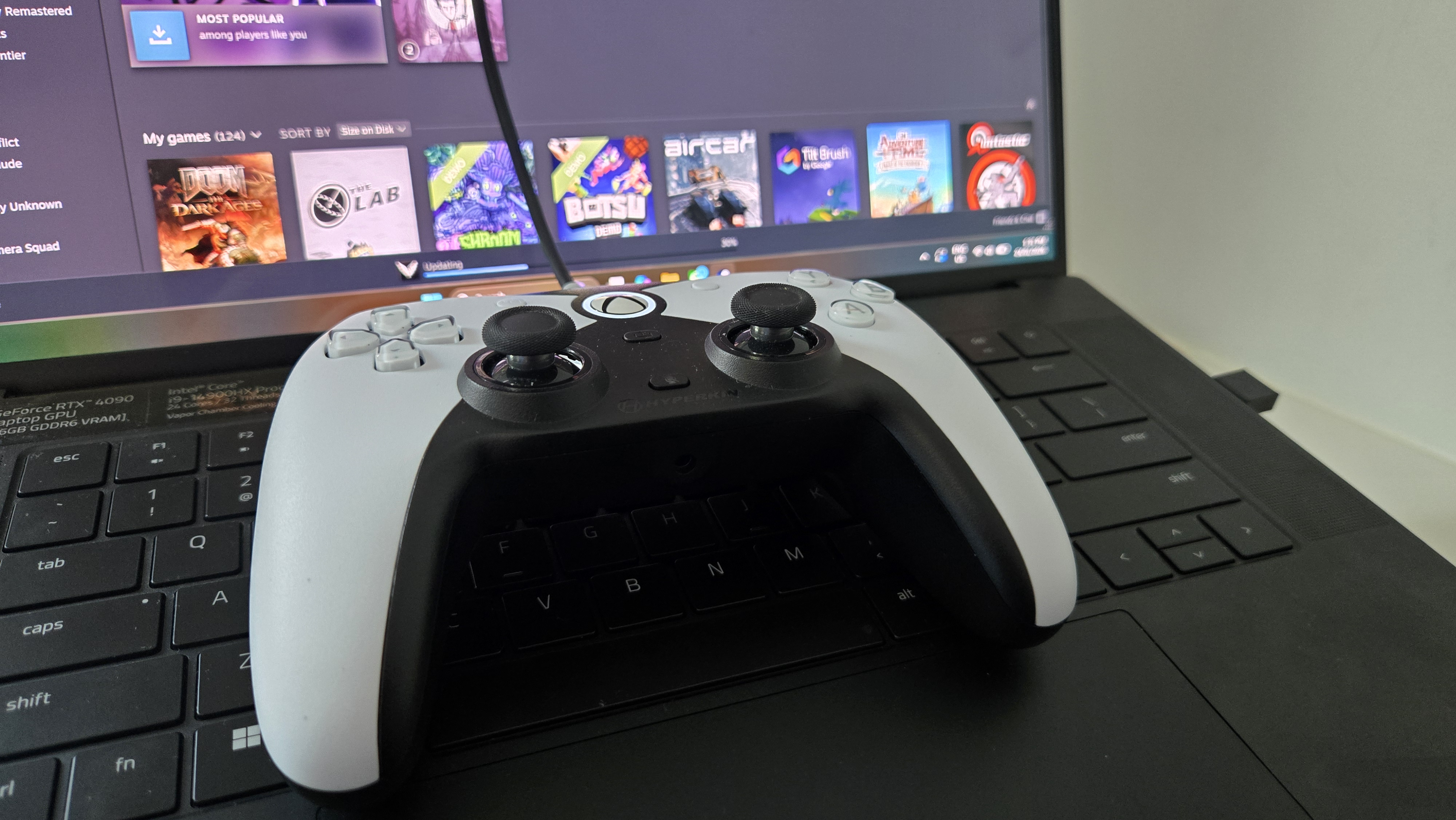 The Hyperkin Competitor on a gaming laptop.