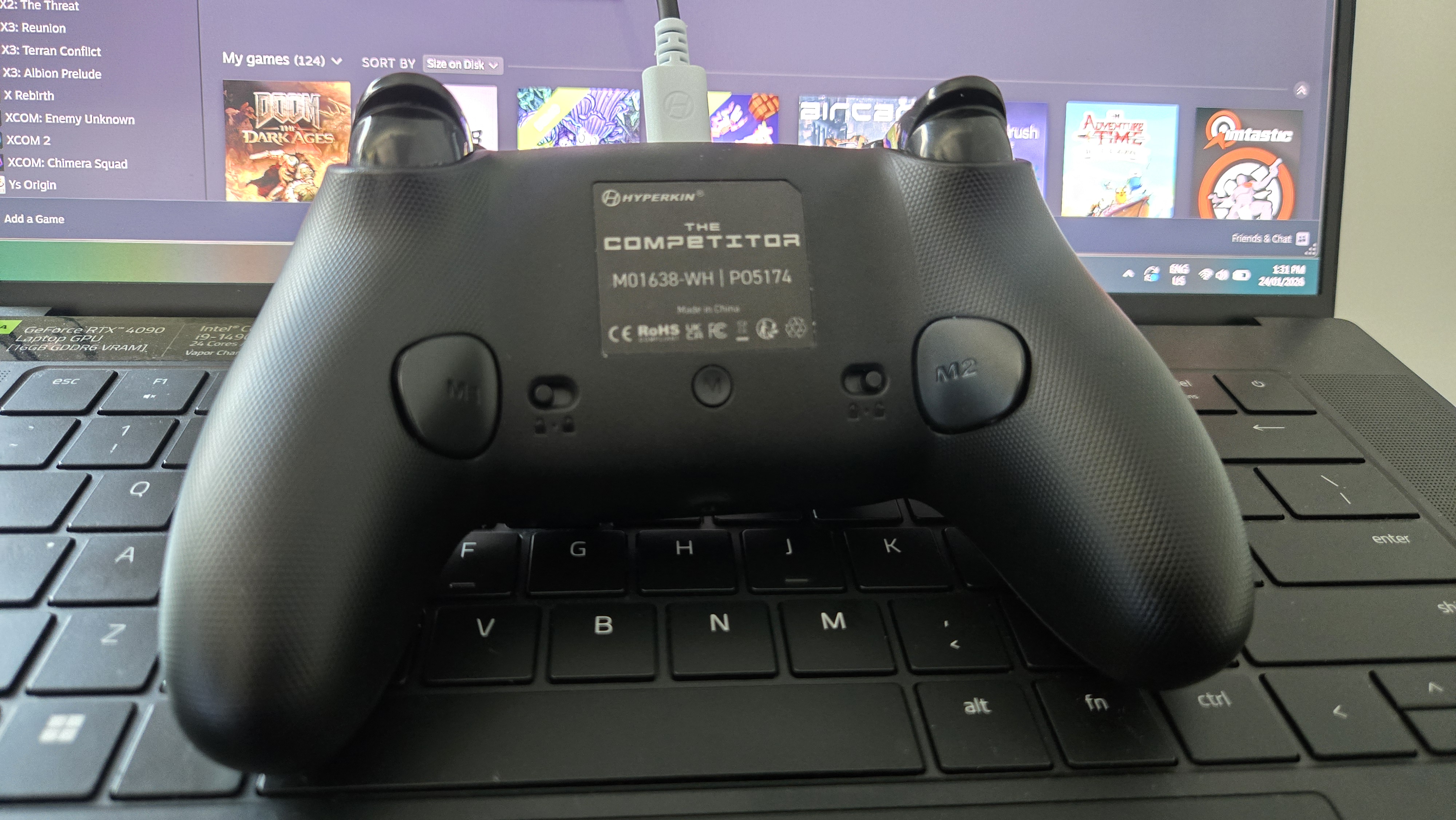 The Hyperkin Competitor on a gaming laptop.