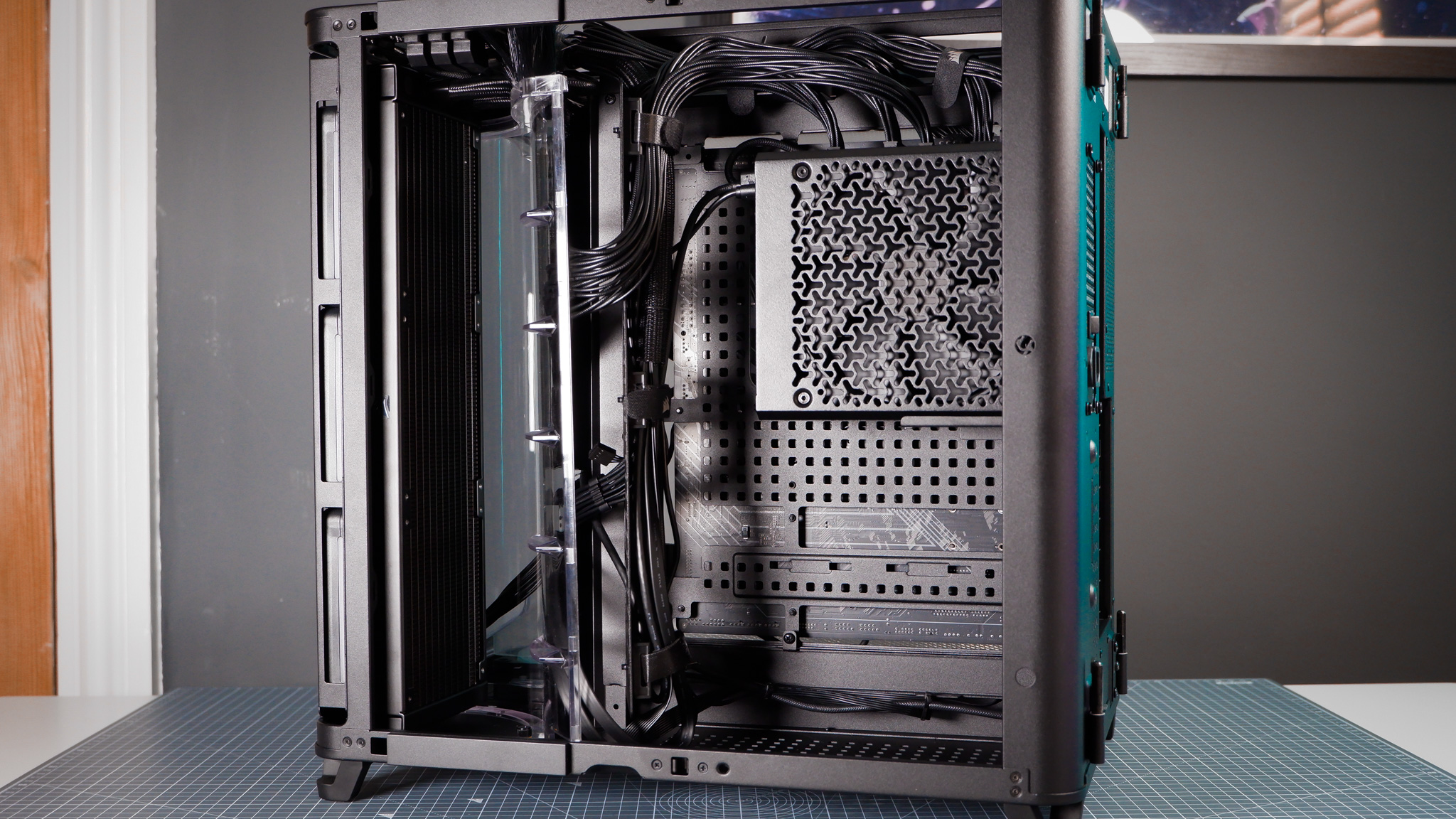 A Corsair Air 5400 PC case on a desk with various parts installed.