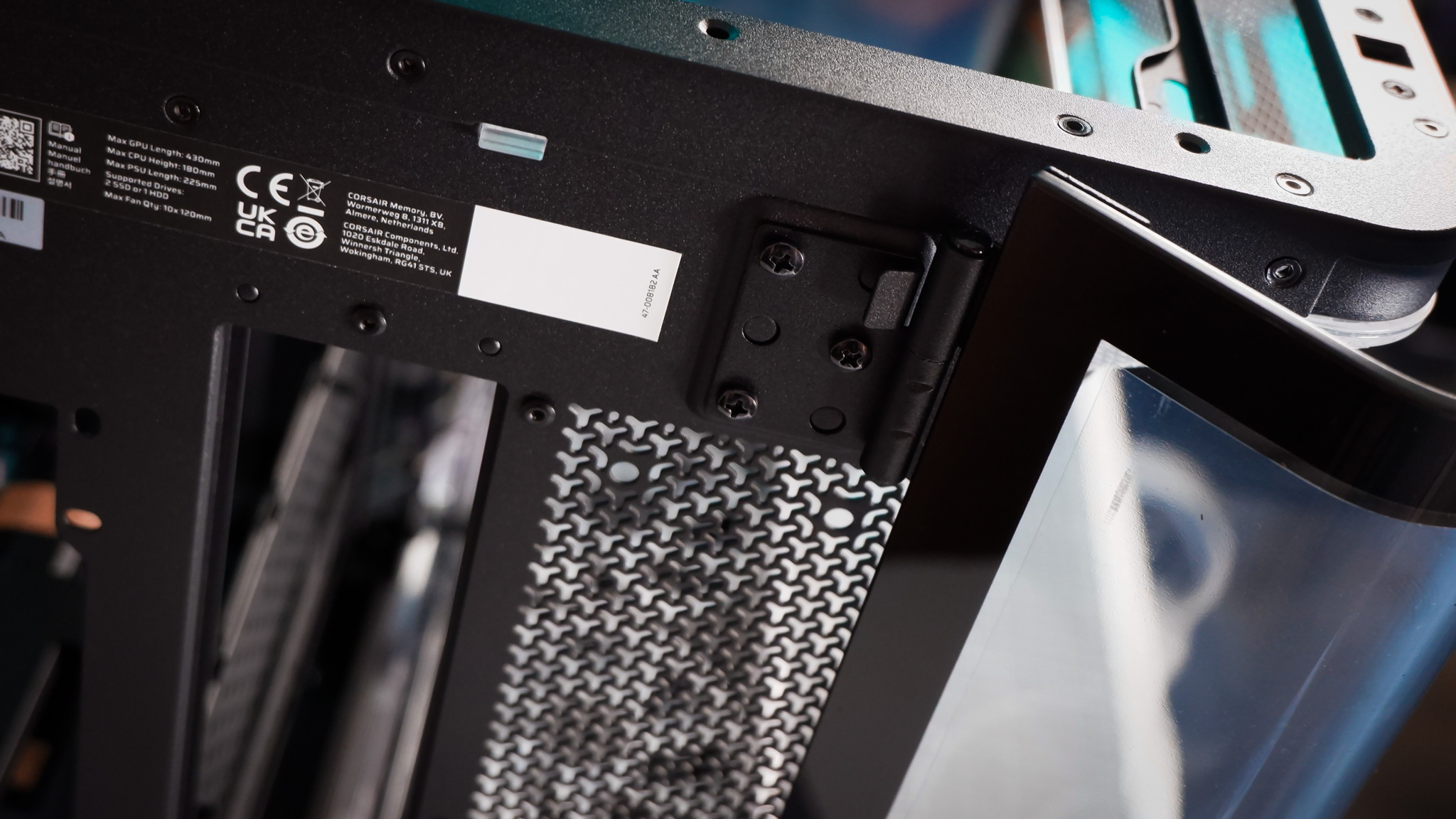 A Corsair Air 5400 PC case on a desk with various parts installed.