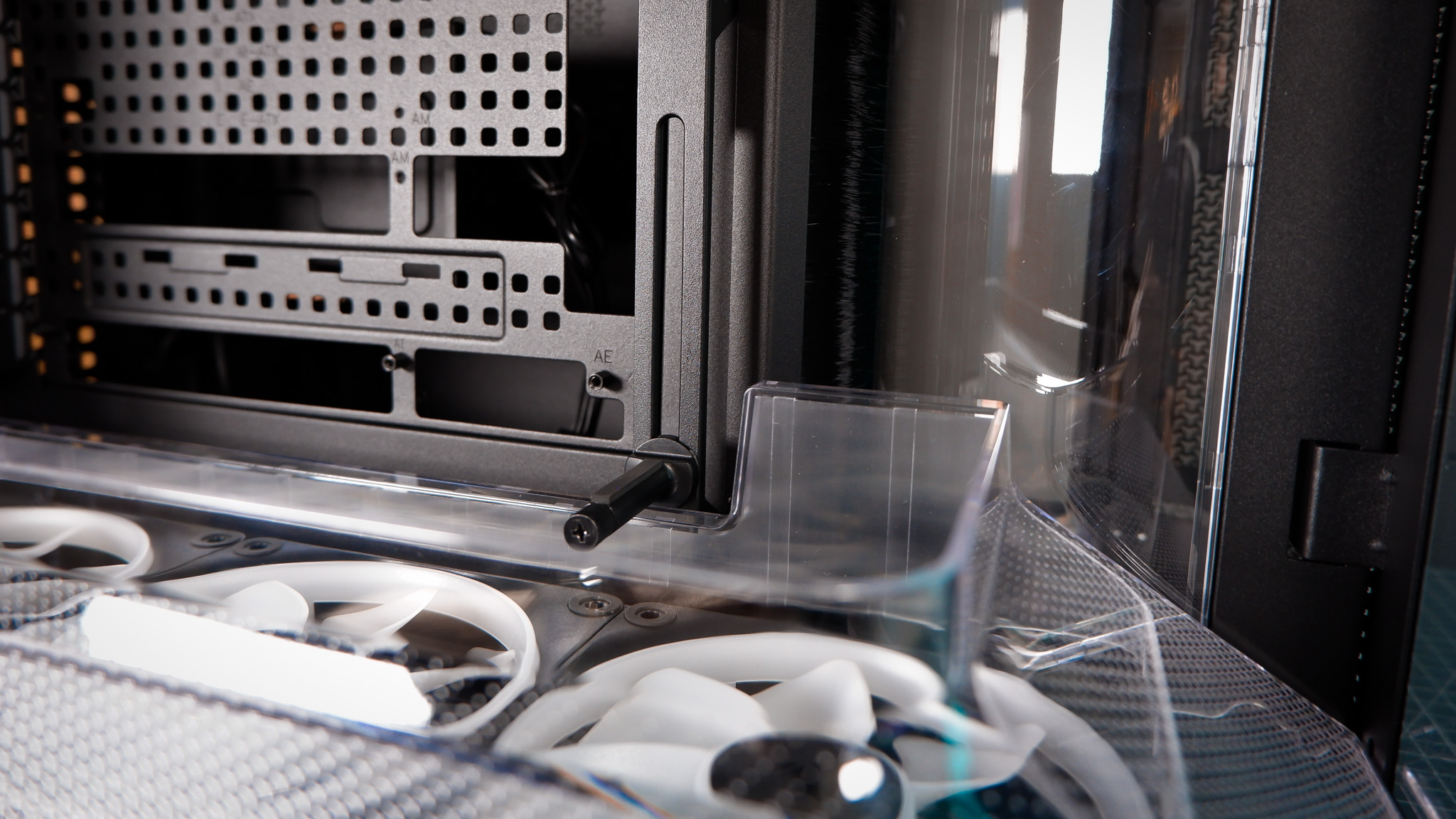 A Corsair Air 5400 PC case on a desk with various parts installed.