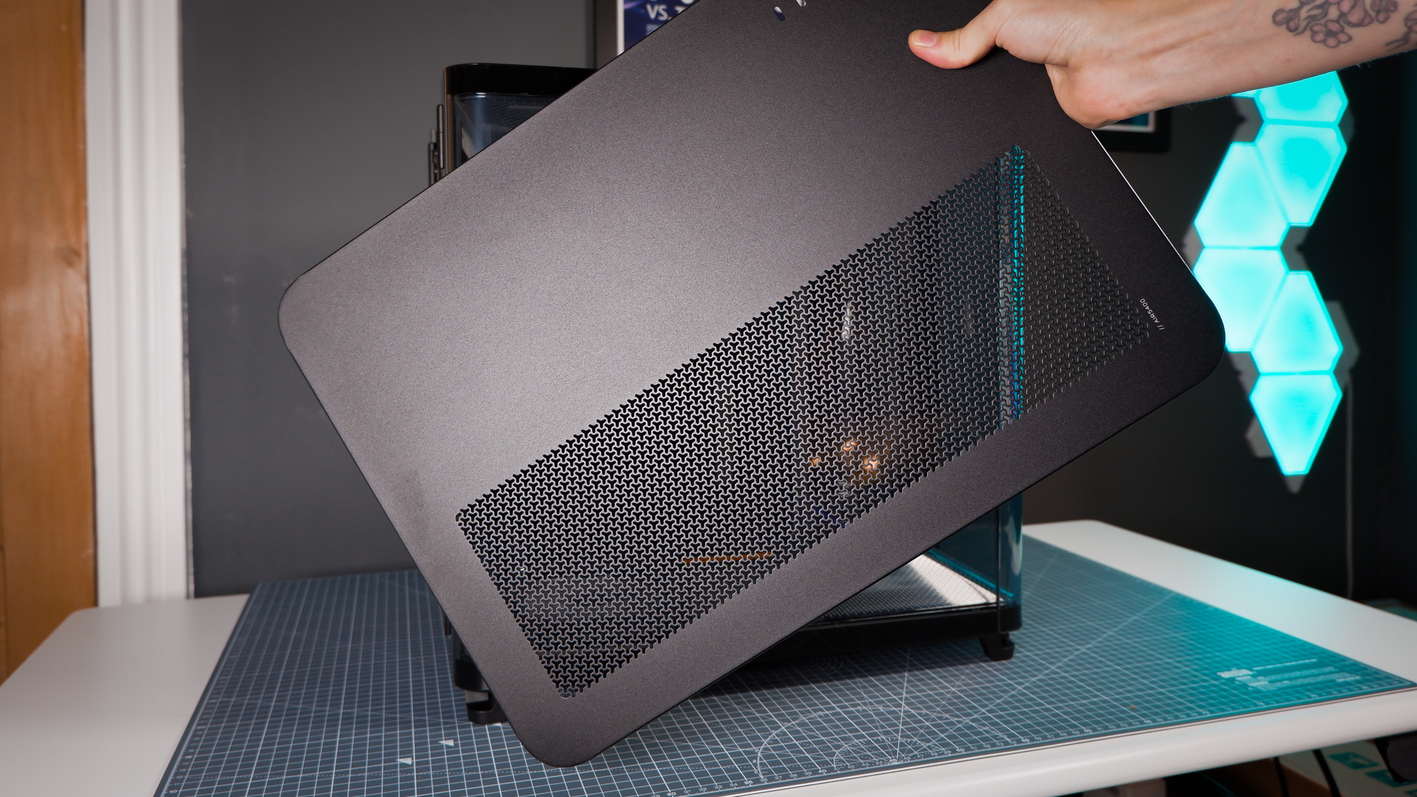 A Corsair Air 5400 PC case on a desk with various parts installed.