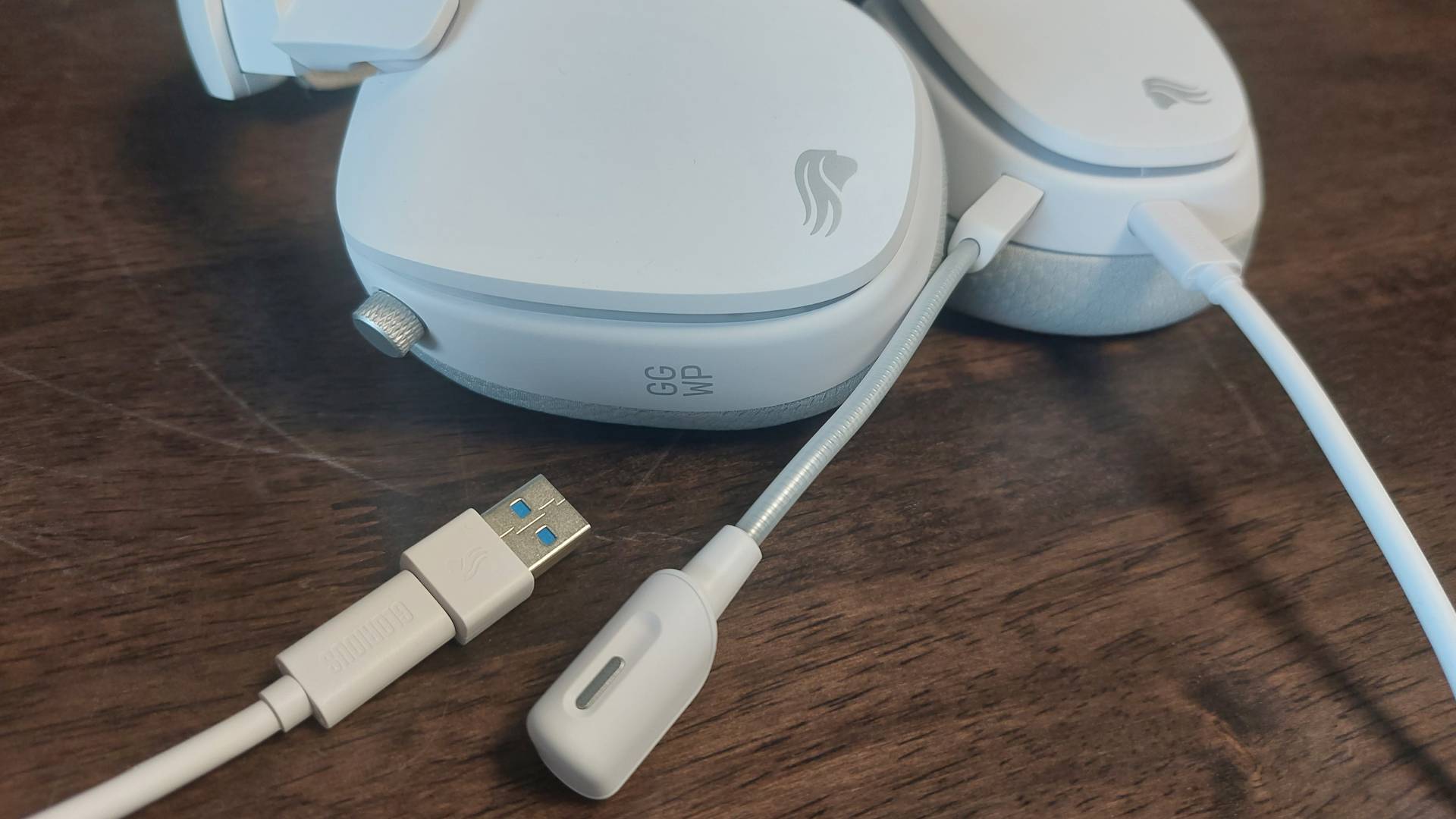 The Glorious GHS Eternal and GHS Eternal RGB wired gaming headsets in white and black, seen from various angles.