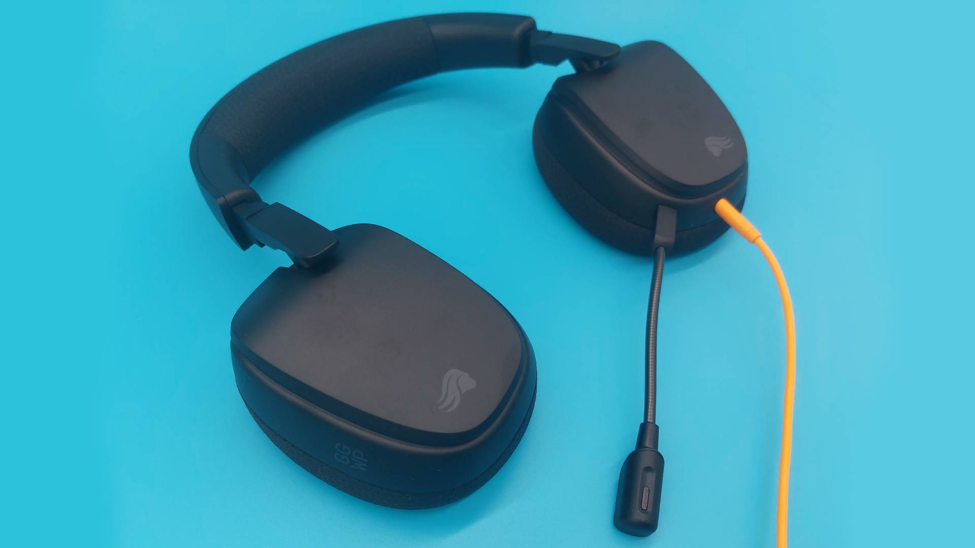 The Glorious GHS Eternal and GHS Eternal RGB wired gaming headsets in white and black, seen from various angles.