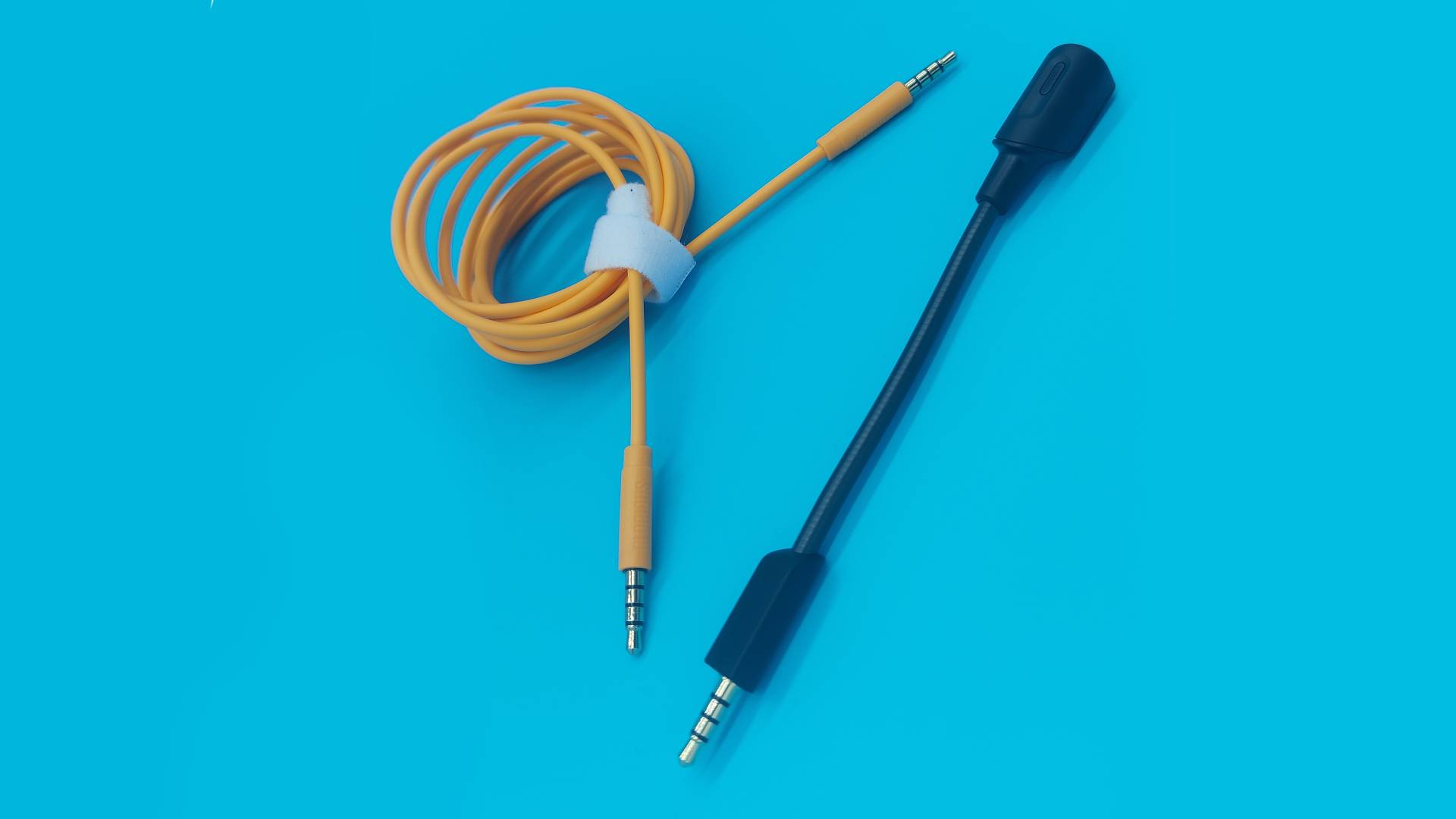 The Glorious GHS Eternal and GHS Eternal RGB wired gaming headsets in white and black, seen from various angles.