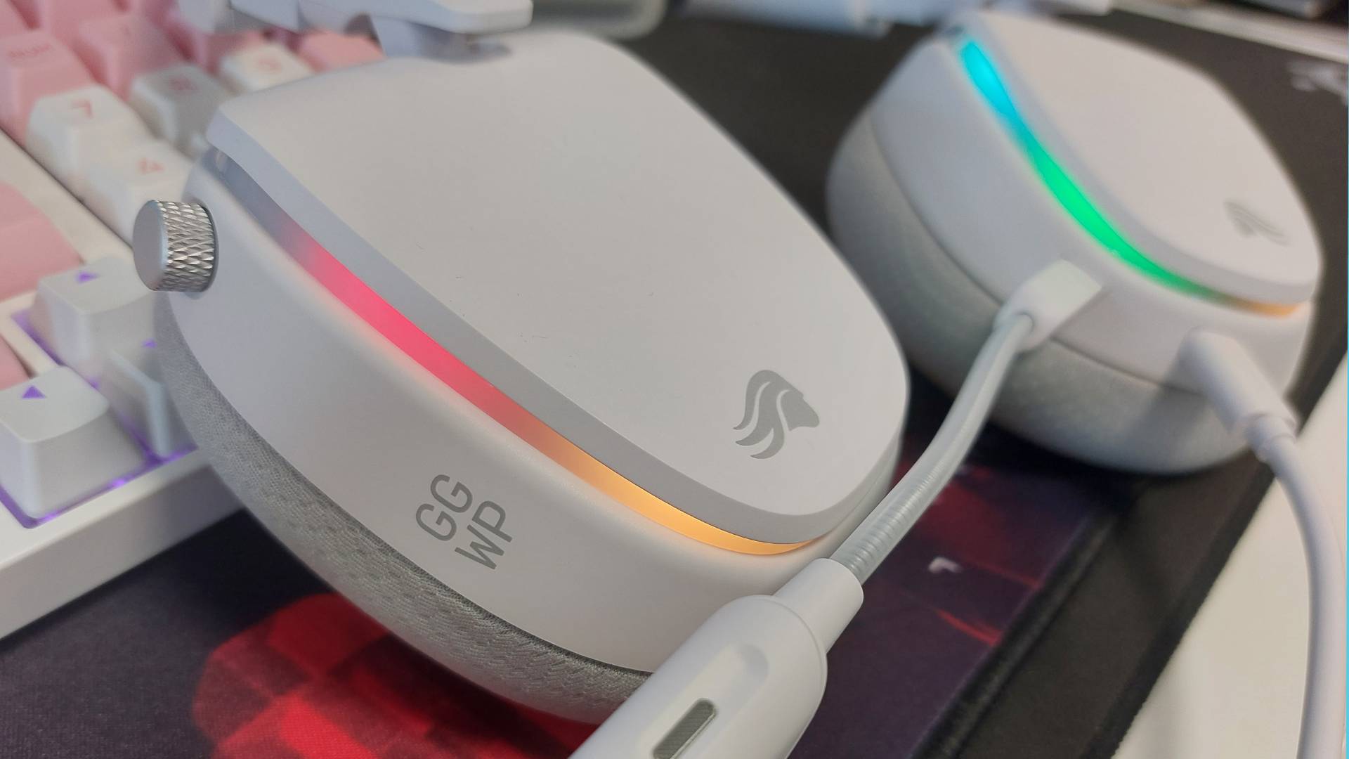 The Glorious GHS Eternal and GHS Eternal RGB wired gaming headsets in white and black, seen from various angles.