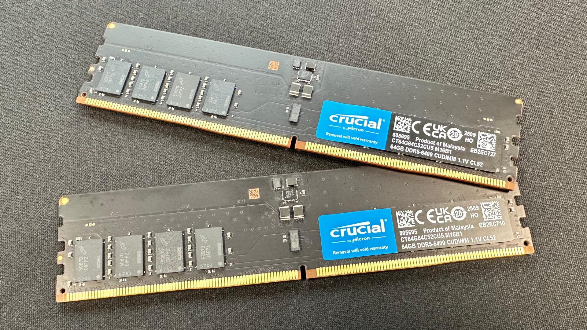 A photo of a 128 GB Crucial DDR5-6400 CUDIMM kit.