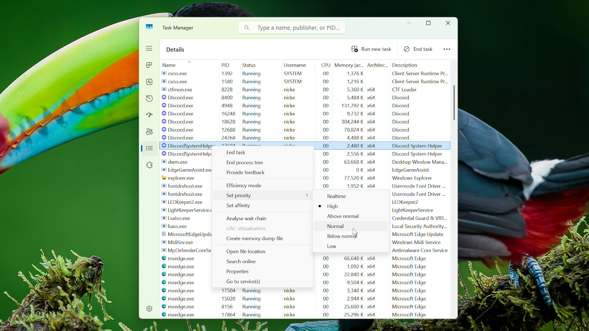 A screenshot of Windows 11's Task Manager, showing the Details page and the default priority for one of Discord's multiple processes