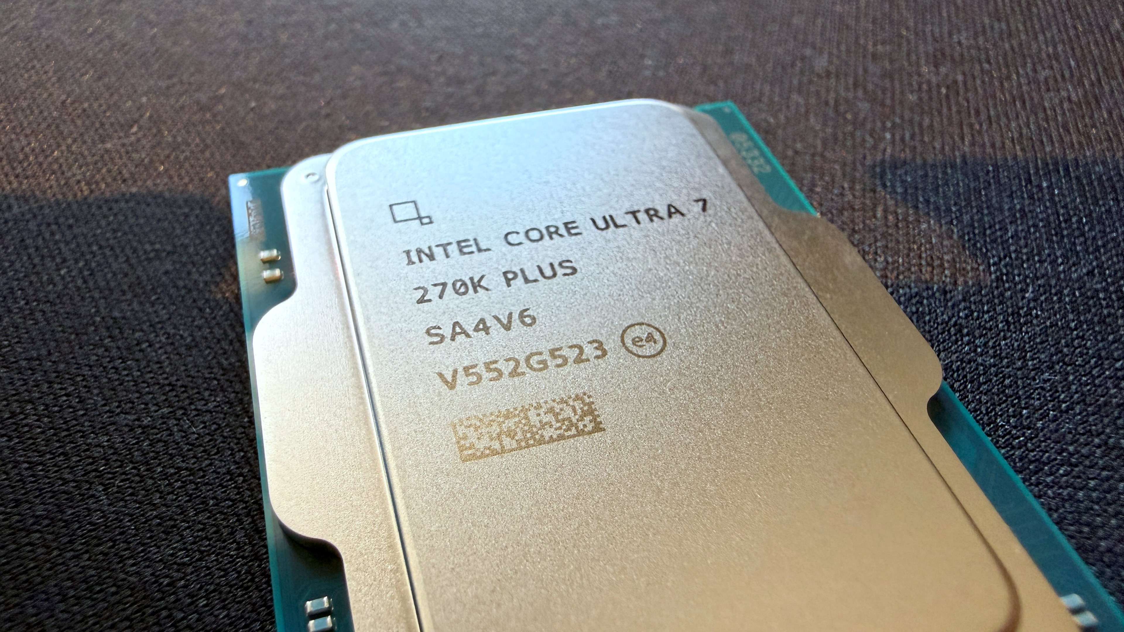 A photo of an Intel Core Ultra 7 2750K Plus processor, with a gradient light effect cast across it