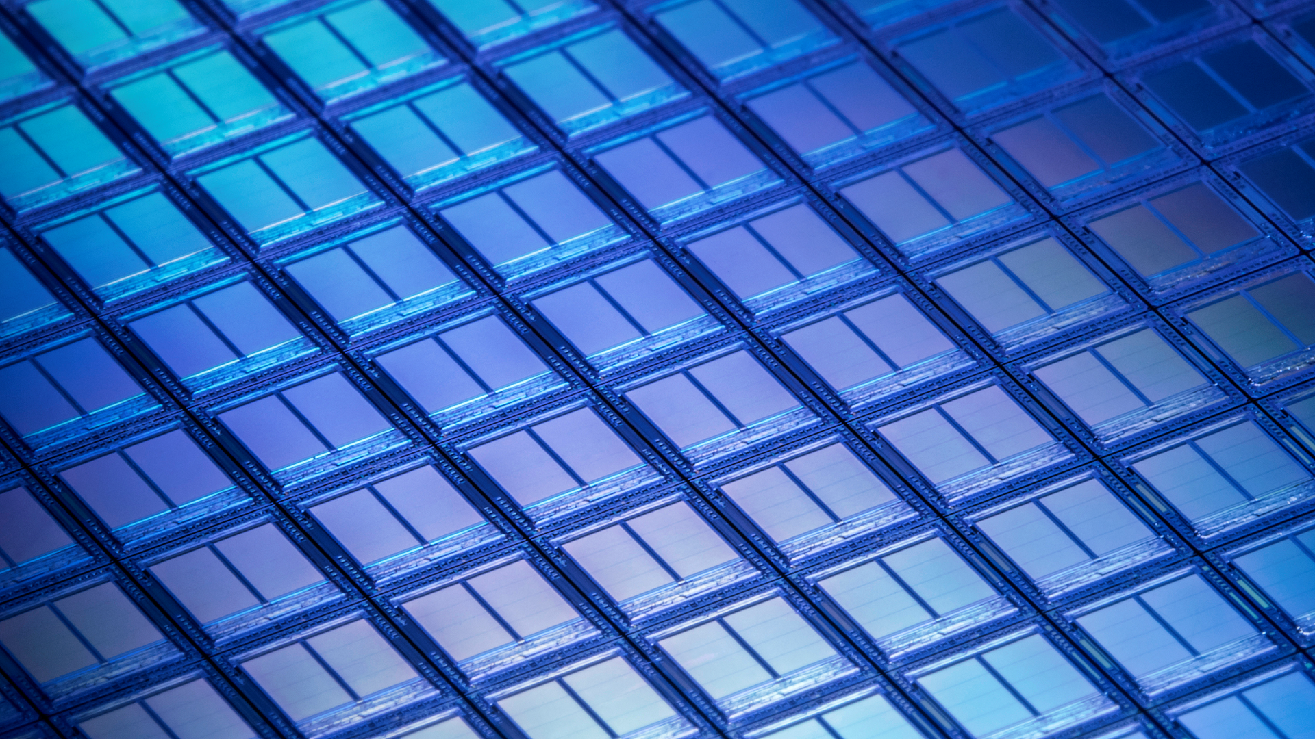 Flash Memory Wafer Macro Detail - stock photo: Slash Memory Chips seen at 10x Macro Magnification in UV light.