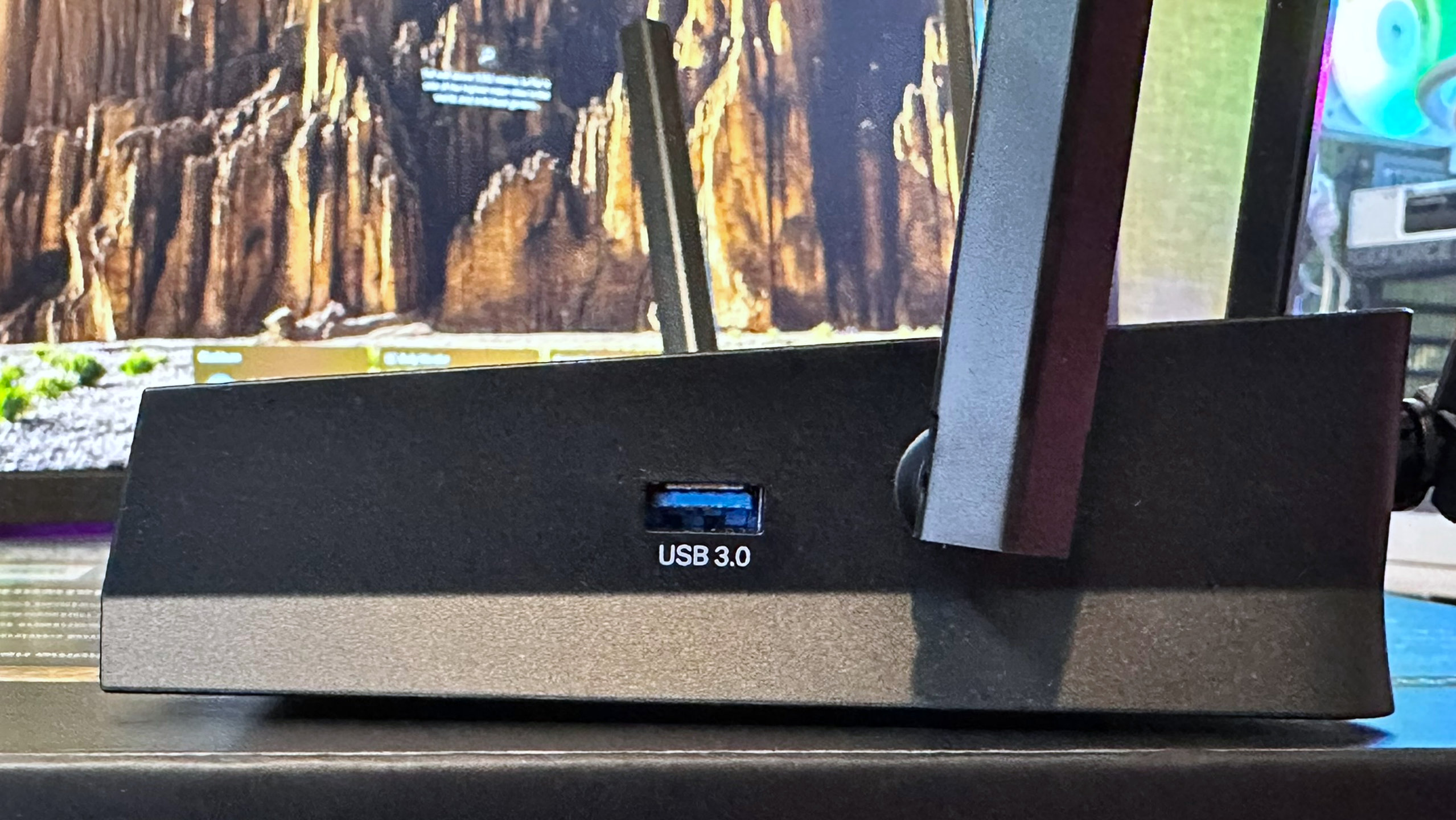 A photo of a TP-Link Archer BE9700 Wi-Fi 7 router, showing the USB 3.0 port on the side panel.