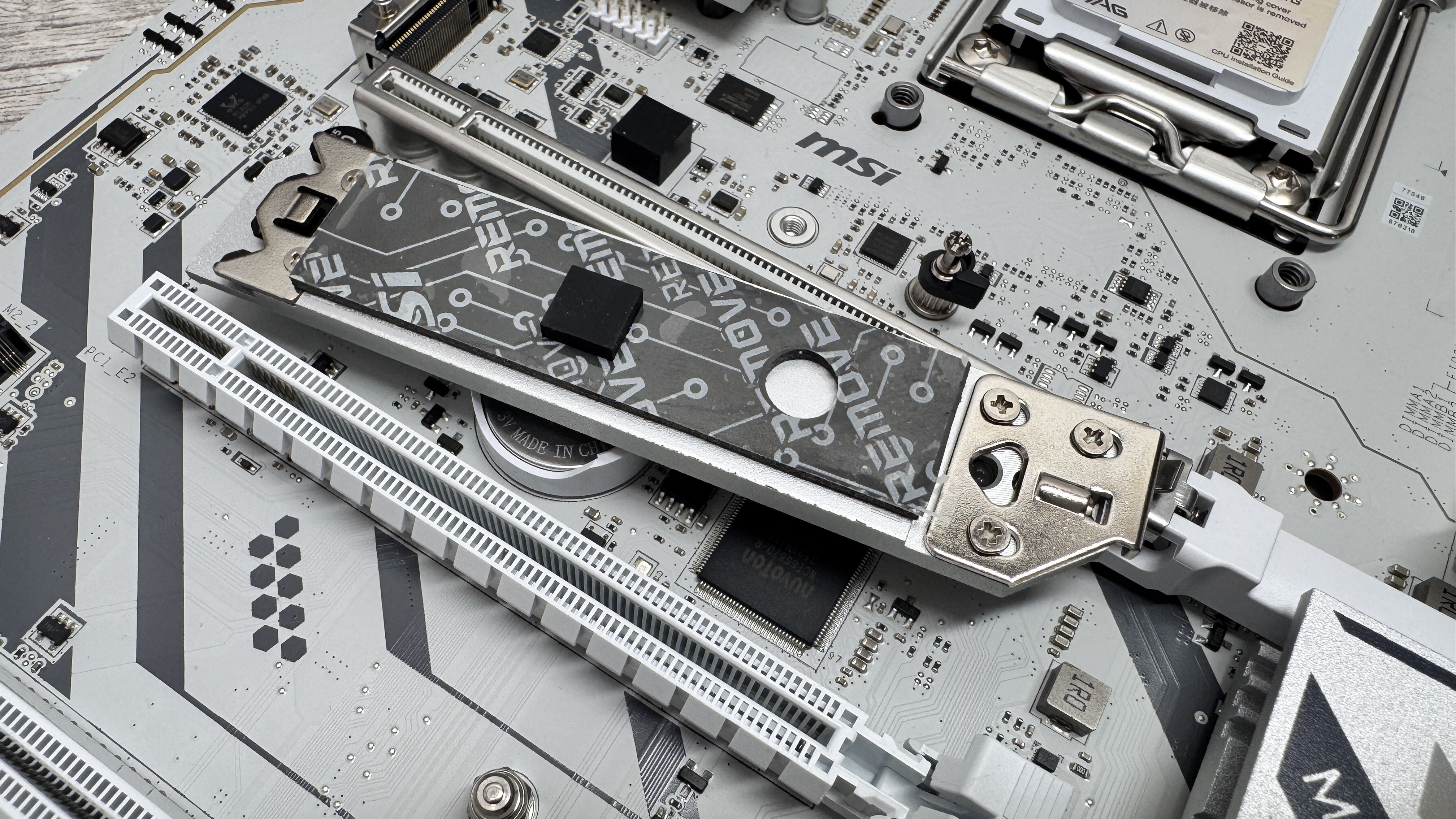 MAG B850 Gaming Plus Max WiFi on a desk.