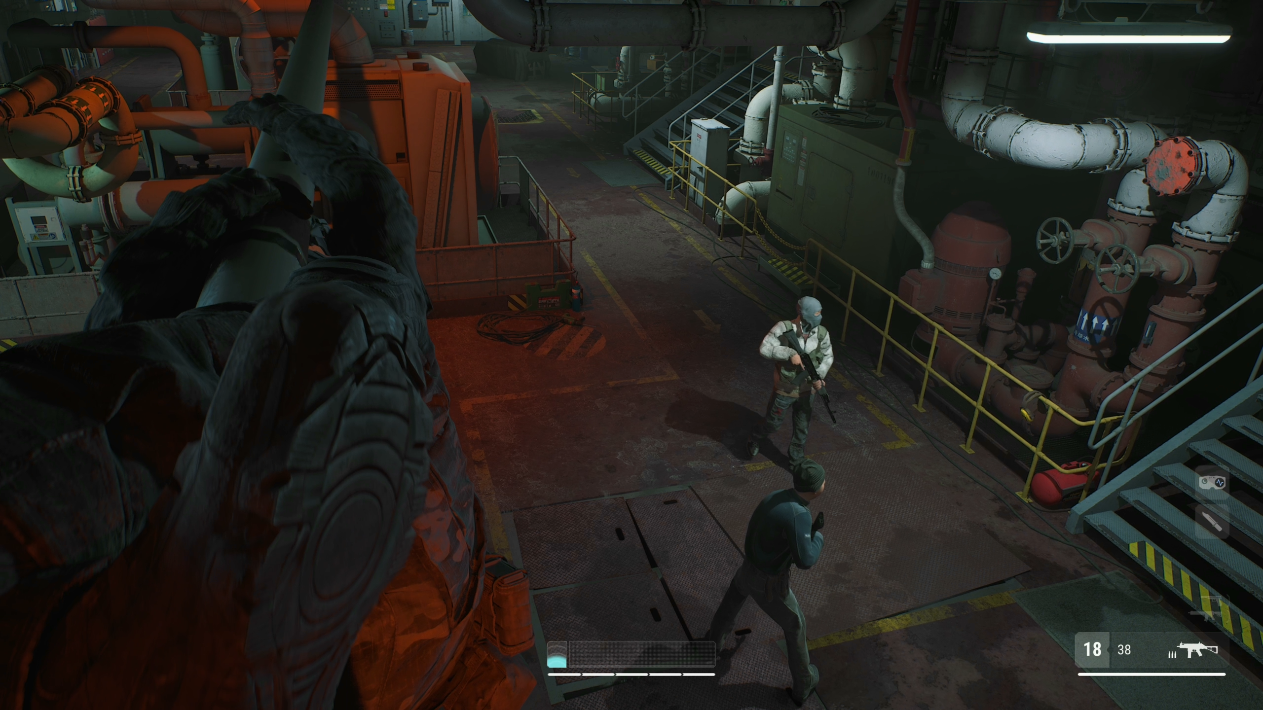 Guy hangs from a pipe as two guards pass below.