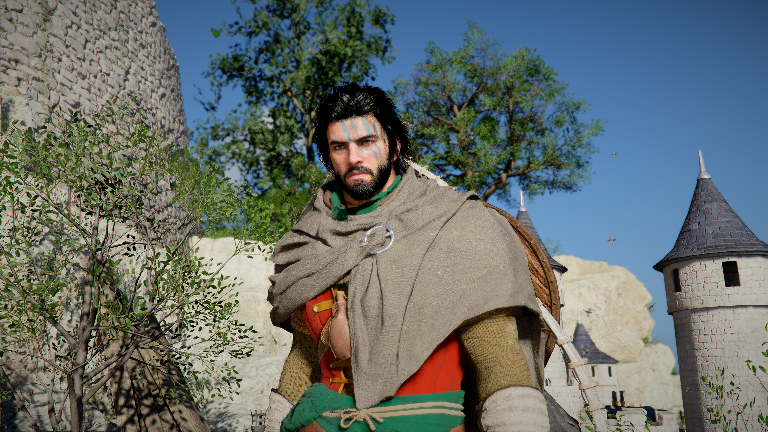Crimson Desert: A close-up of Kliff looking ahead, standing next to a model castle.