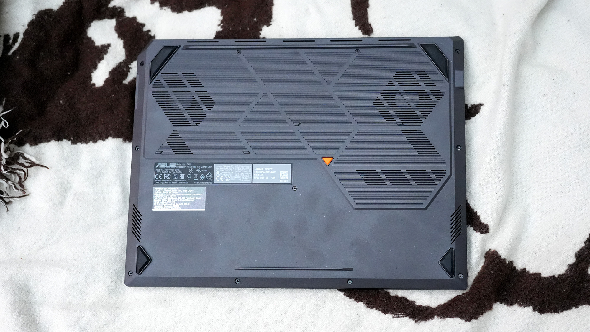 An Asus TUF Gaming A16 2025 on a white background, fit with an RTX 5050.