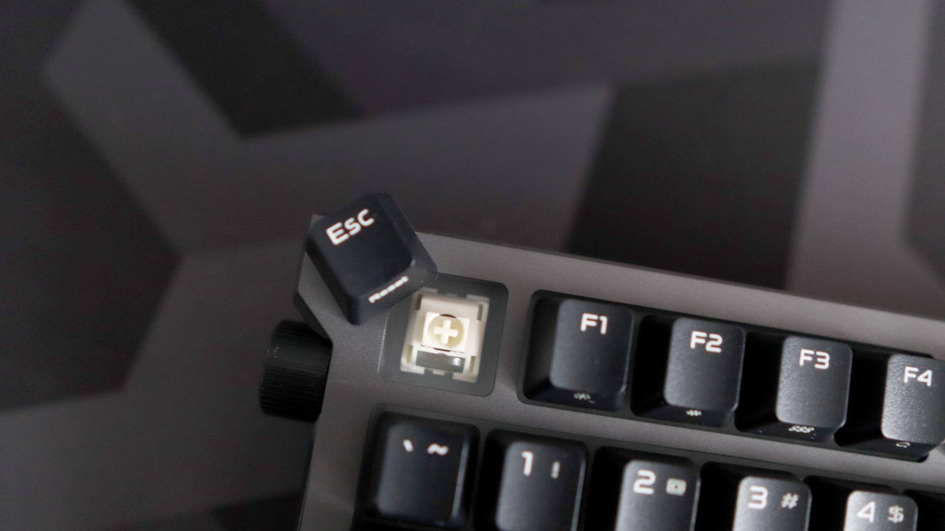 Asus ROG Strix Morph 96 Wireless on a desk mat.