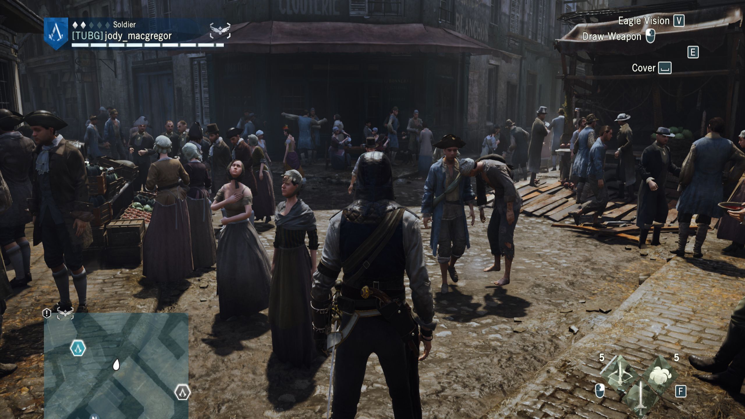 A crowd gathers in the streets of Paris