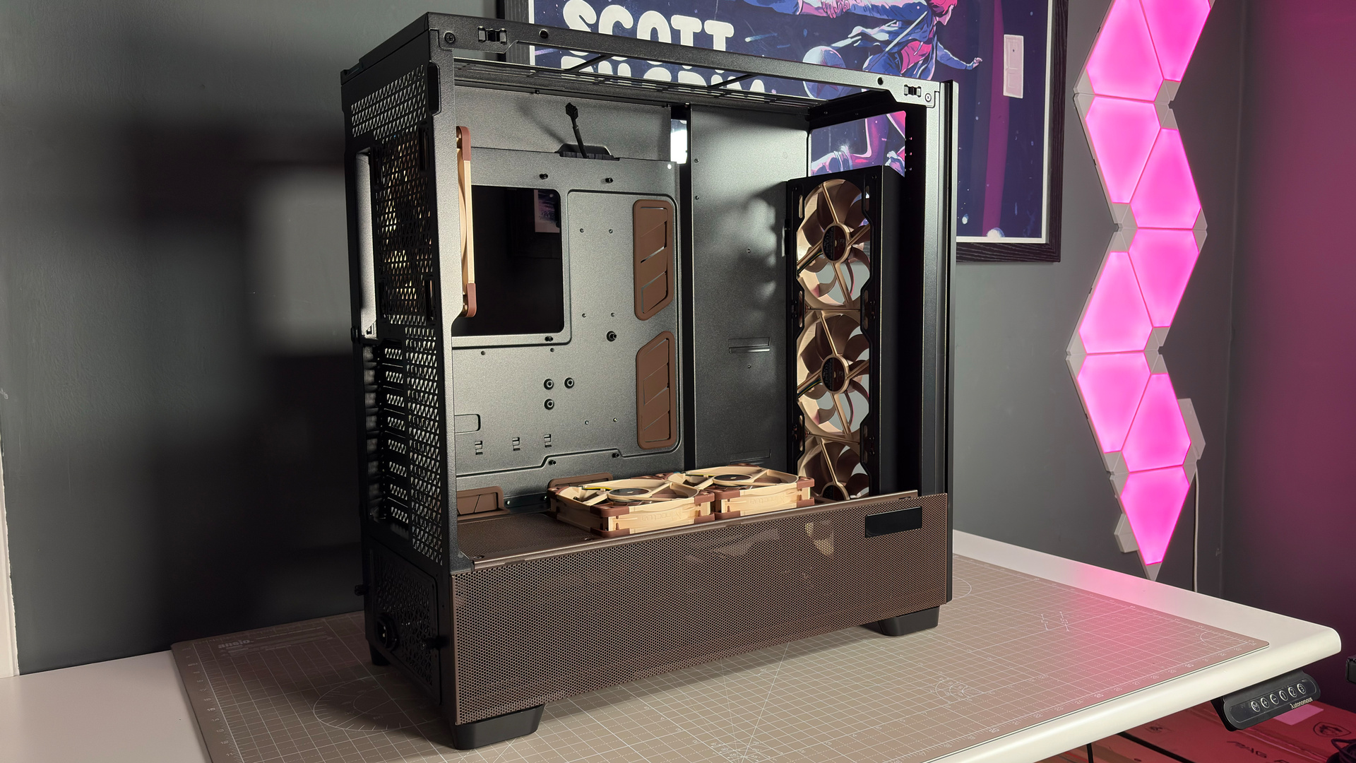 Antec Flux Pro Noctua Edition without any PC inside on a desk.