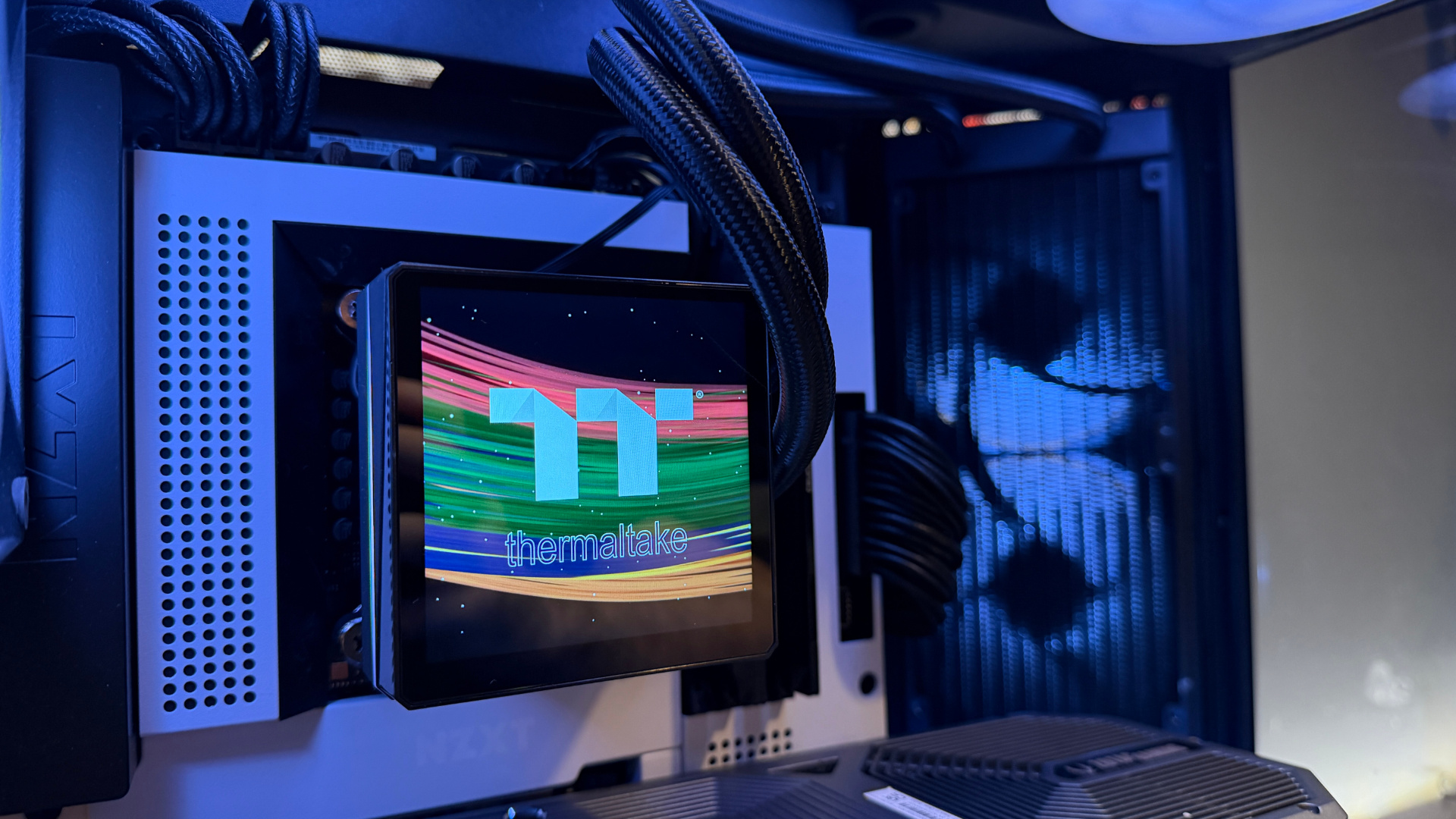 Thermaltake TH360 V3 Ultra ARGB Sync outside of a PC case with fans installed.