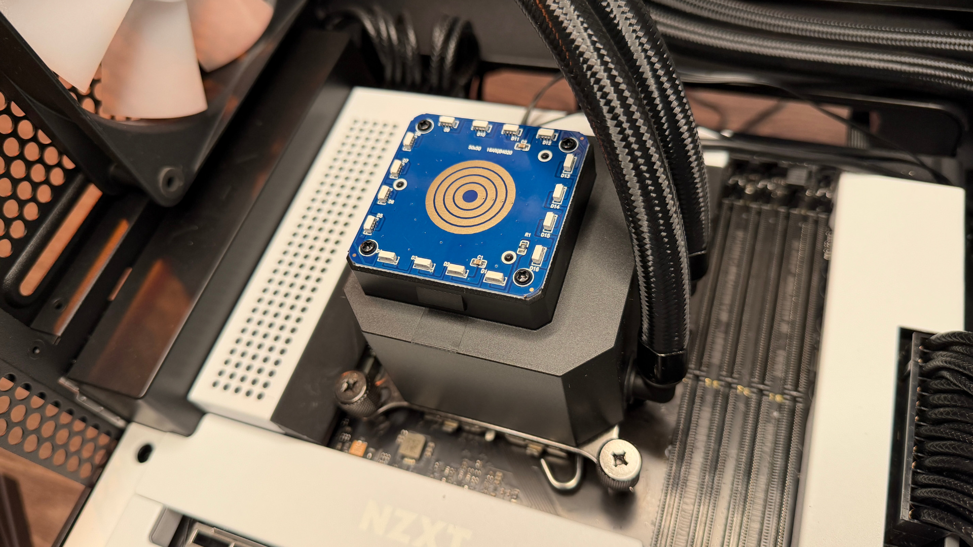 Thermaltake TH360 V3 Ultra ARGB Sync outside of a PC case with fans installed.