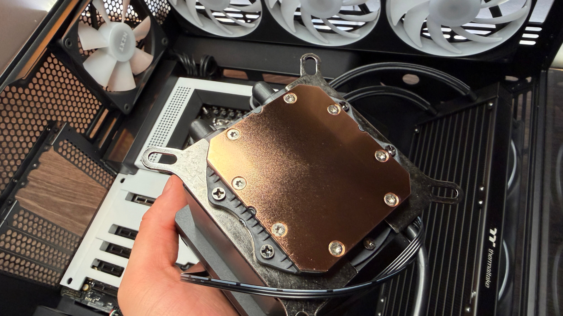 Thermaltake TH360 V3 Ultra ARGB Sync outside of a PC case with fans installed.