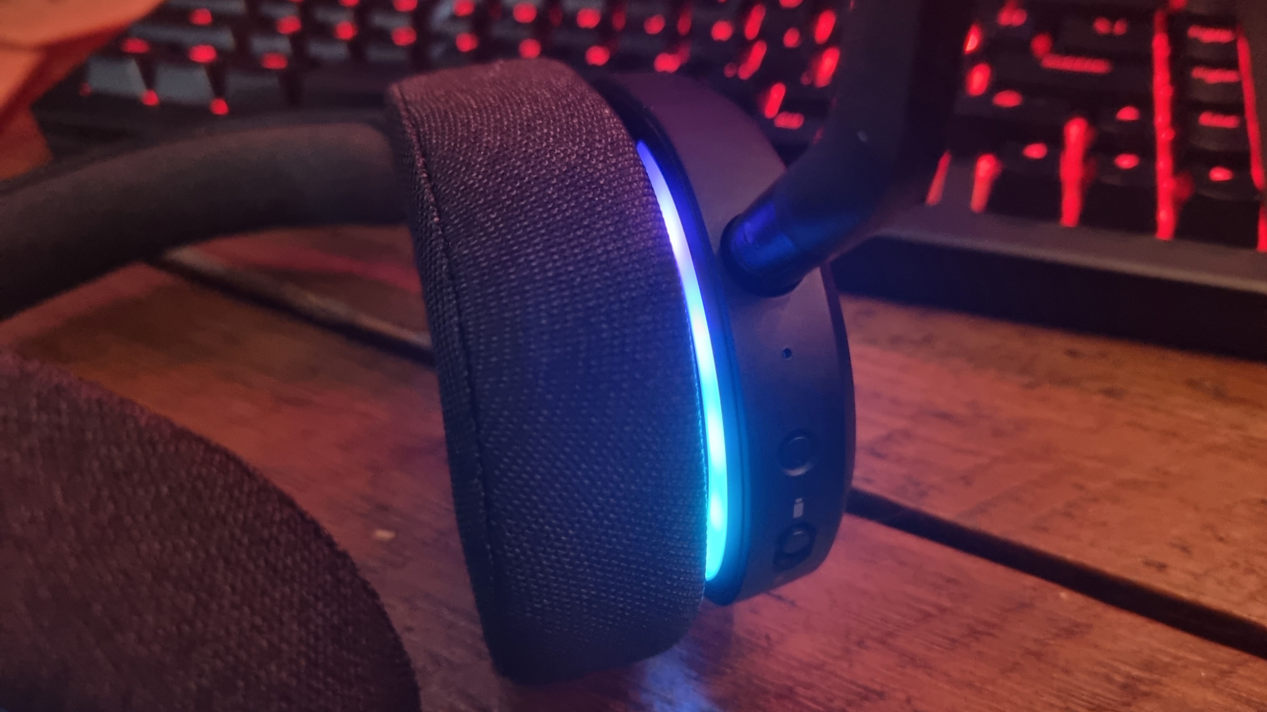 A close up of the RGB ring of the left earcup of the Fractal Design Scape wireless gaming headset